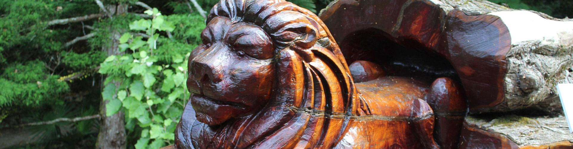 UK timber sculptors, garden wood sculptures, wood carving artists UK, outdoor wooden art